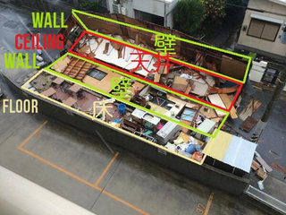 Illustration for article titled Japanese Building Falls Apart in a Most Unexpected Way